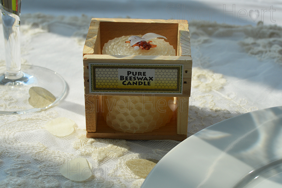 Pure beeswax candle wedding favour. Supplied in a wooden display box with cute bee decoration and cellophane wrap.